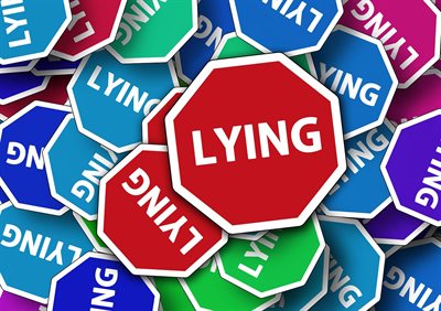 multi-coloured cards with the word &amp;#39;lying&amp;#39; on them